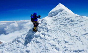 climber climbing towards makalu