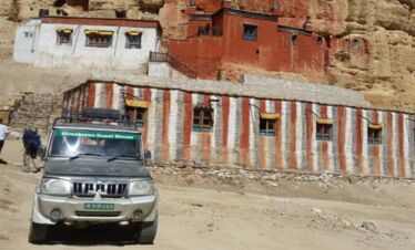 our jeep infront of cave