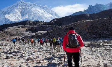 trekkers walking on the trail to ebc