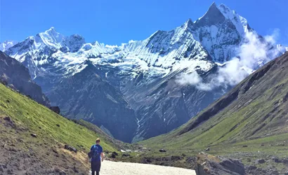 Lost in the moment — one soul, one mountain, one view.