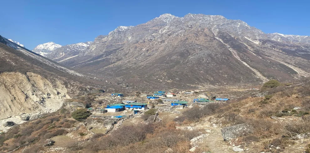A Hidden Himalayan Hamlet Beneath Towering Peaks.