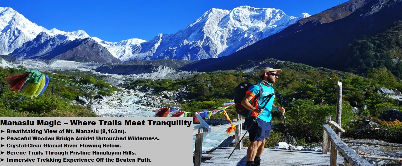 Trekker on a prayer-flag-lined bridge with mt. Manaslu’s snowy peak rising ahead on the manaslu circuit trek nepal.